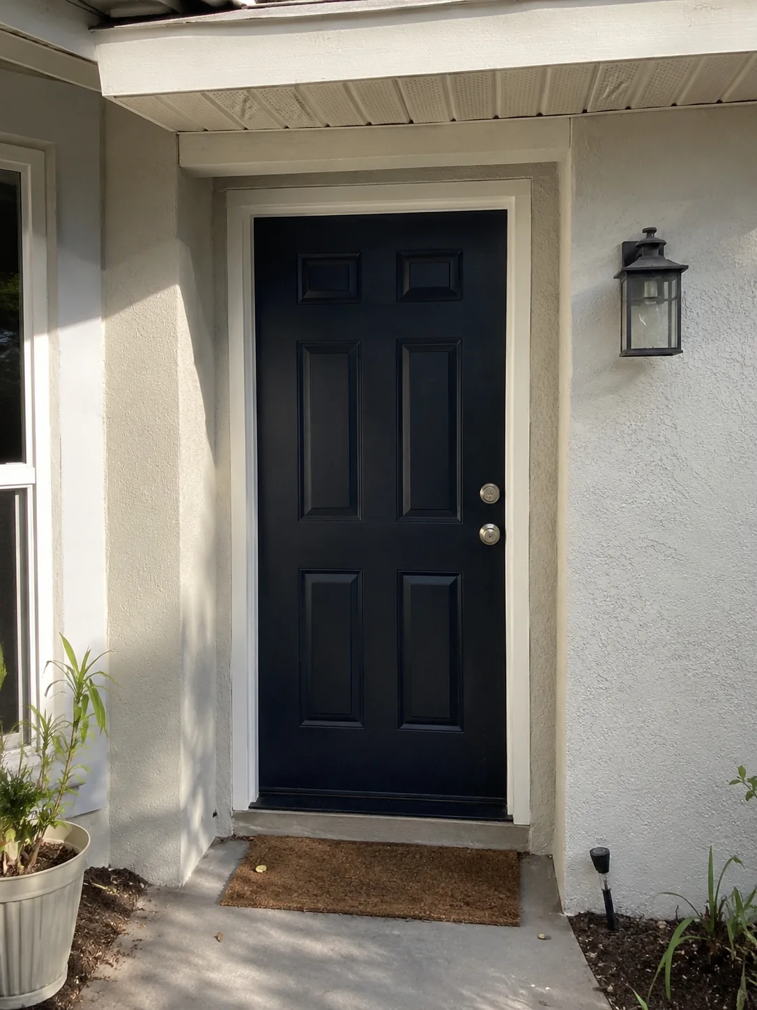 Front door painted by Westchase Painting Company