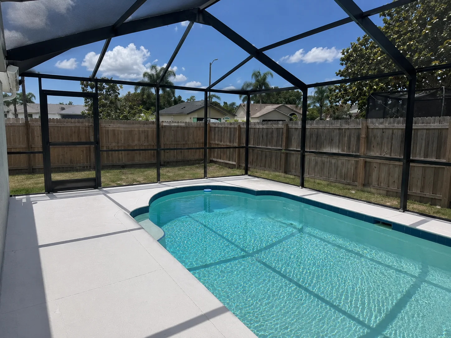 Repainted pool cage and screen enclosure