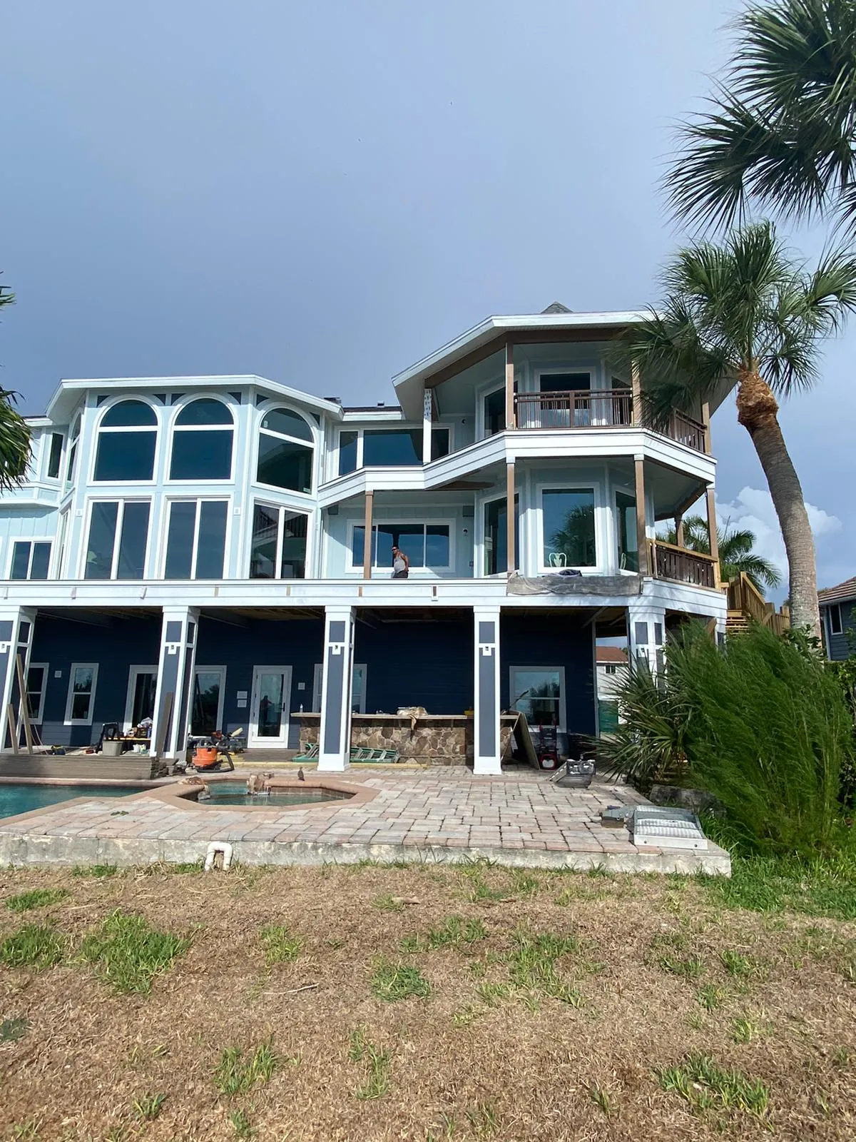 Mediterranean-style coastal home exterior painting